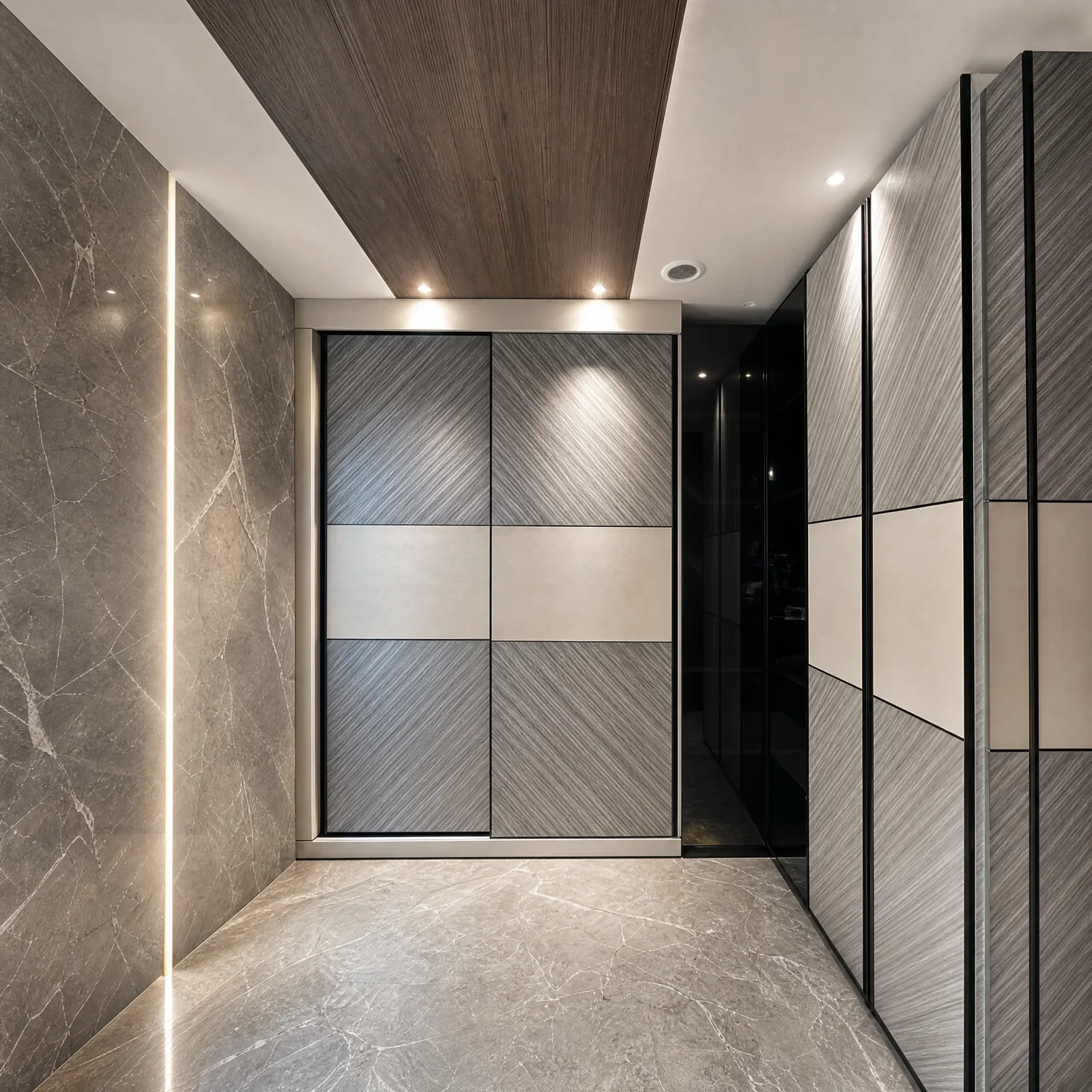 Walk-in wardrobe corridor in book-matched grey marble with mixed sliding doors